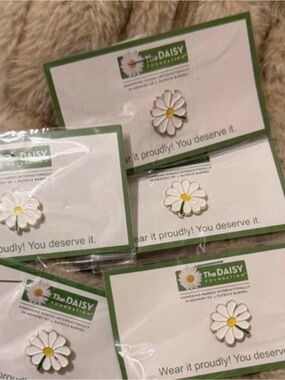 Daisy Foundation pin
